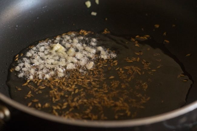 finely chopped ginger added to hot oil. 