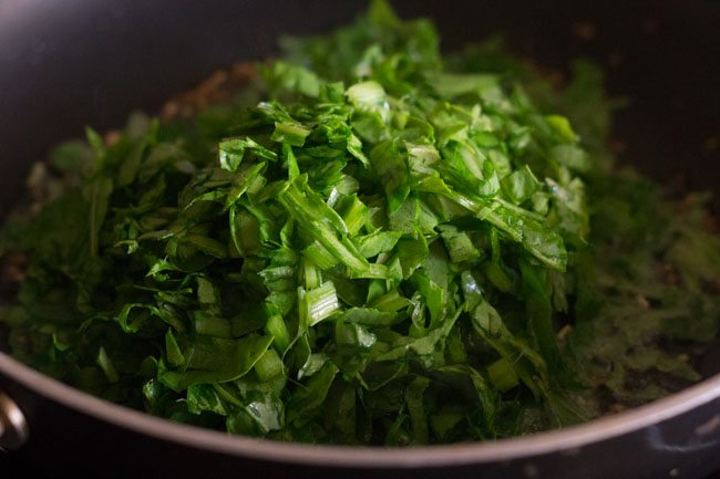 chopped spinach added to pan. 