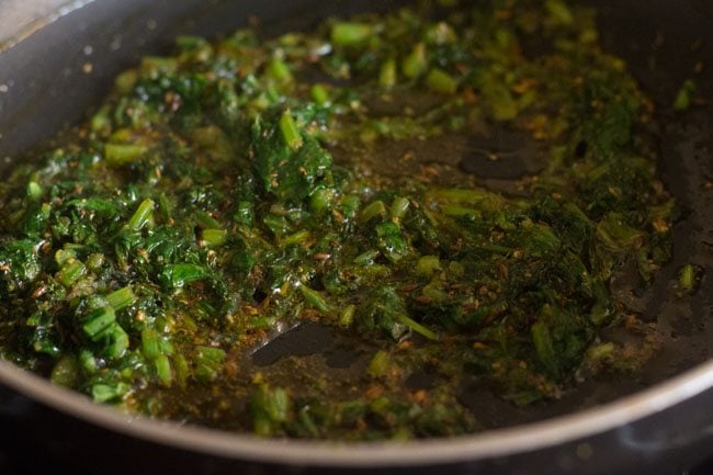 spices mixed with spinach. 