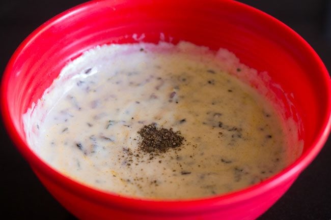 black pepper powder added to palak raita. 