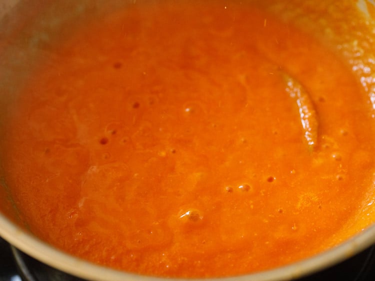 simmering tomato puree