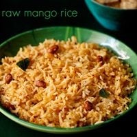 mango rice served in a green plate.