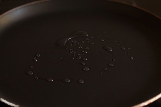 oil spread on frying pan