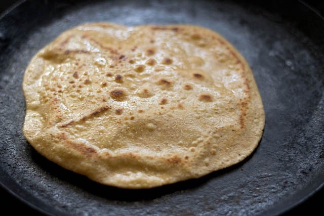 roasted sugar paratha on tawa