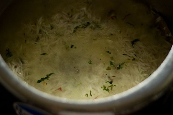 stirring the rice mixture