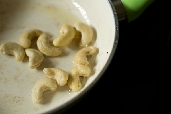 cashews in same white pan