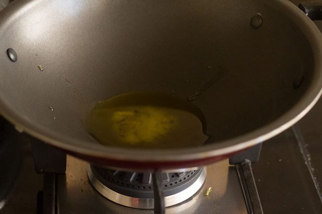ghee melted in bottom of wok
