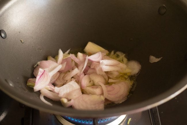 sliced onion added to wok