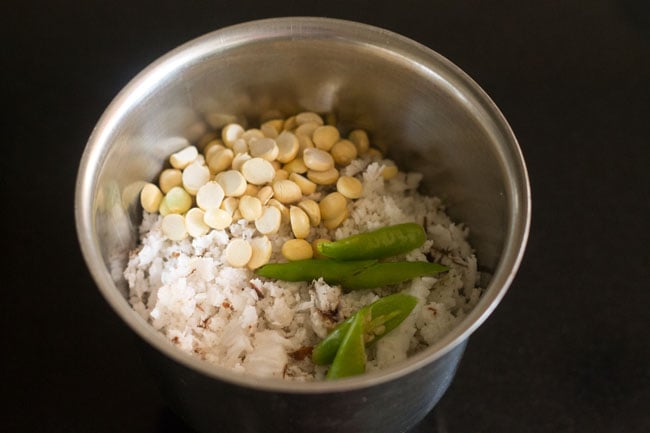 coconut chilies and roasted chana dal added to blender jar