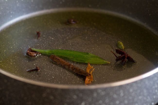 frying spices for palak biryani