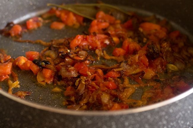 frying tomatoes for palak biryani