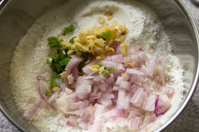 chopped onions, green chillies and ginger added in the bowl