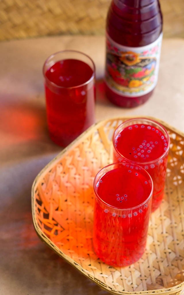 rooh afza drink served on bamboo straw tray