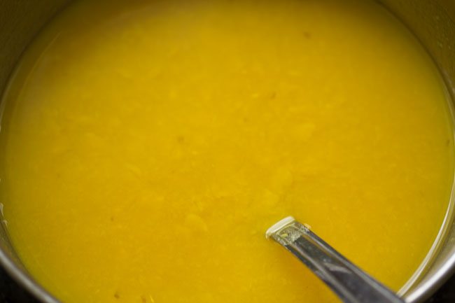 mashing pressure cooked tuvar dal for udupi sambar 