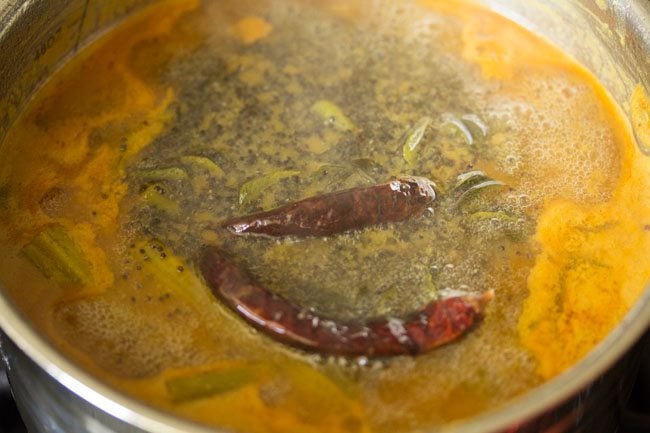 mixing tempering in the udupi sambar 