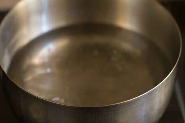water boiling in a steel pan