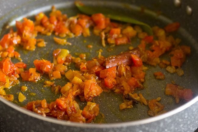 ground spices mixed with tomatoes