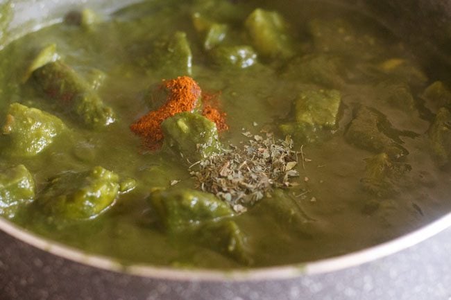 garam masala and dry fenugreek leaves added to aloo palak