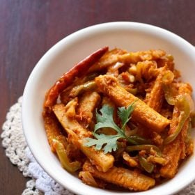 baby corn jalfrezi in a white bowl