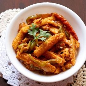 baby corn jalfrezi in a white bowl