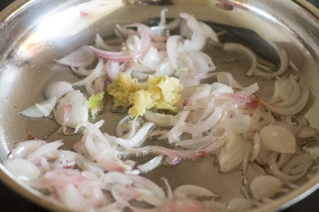 adding ginger-garlic paste in pan