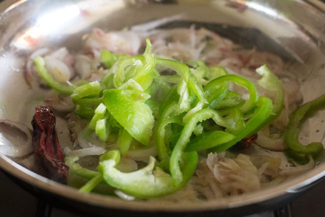 adding sliced capsicum