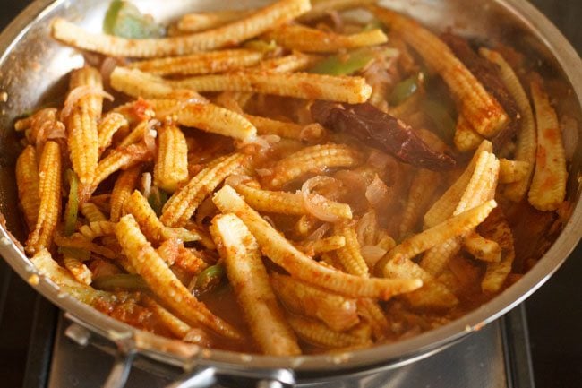 cooking baby corn jalfrezi in oan