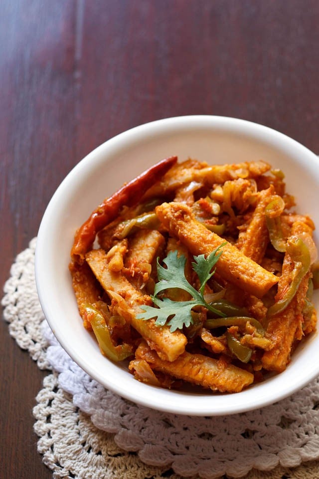 baby corn jalfrezi in a white bowl