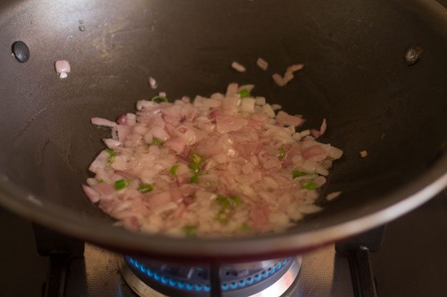sautéing chilies with onions. 