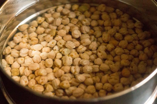 soaking dried chickpeas in water