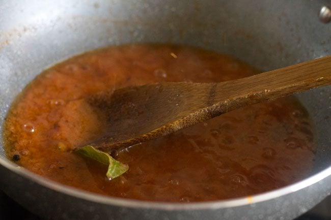 sautéing the ground paste