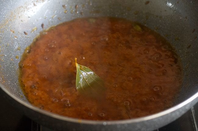 continuing sautéing and cooking the paste