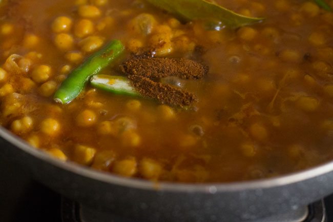 slit green chillies and garam masala powder added to the gravy