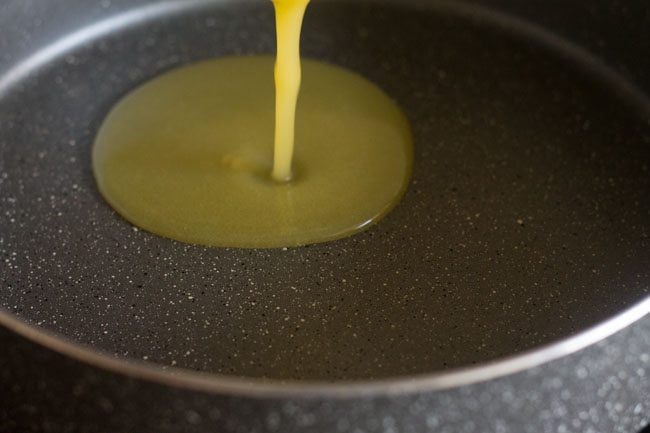 heating ghee in a pan