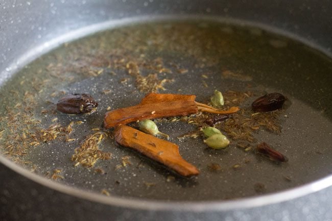 frying the whole spices till fragrant 