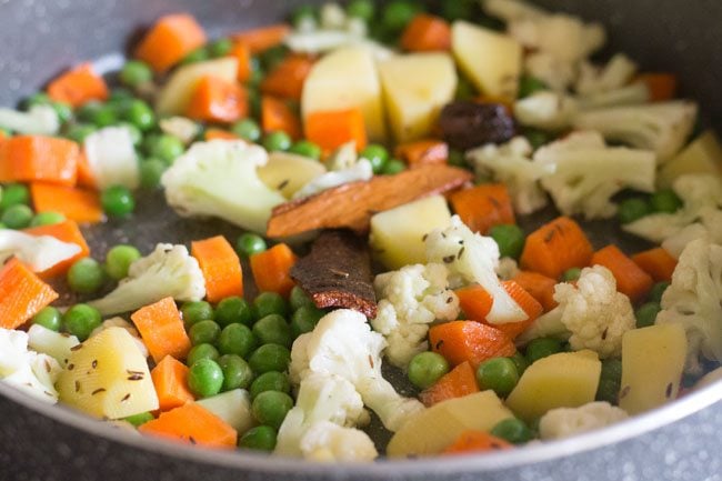 sautéing vegetables in the oan