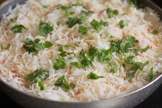 sprinkling remaining mint and coriander leaves and saffron milk 