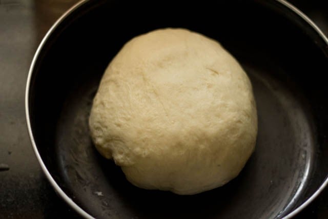 kneading leavened kulcha dough again 