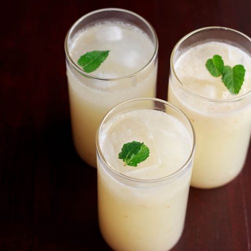 litchi juice garnished with mint leaves and served in three glasses