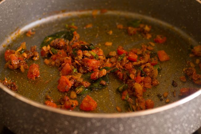 sautéing the spice mixture in the pan