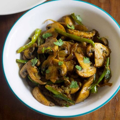 mushroom fry in a white bowl