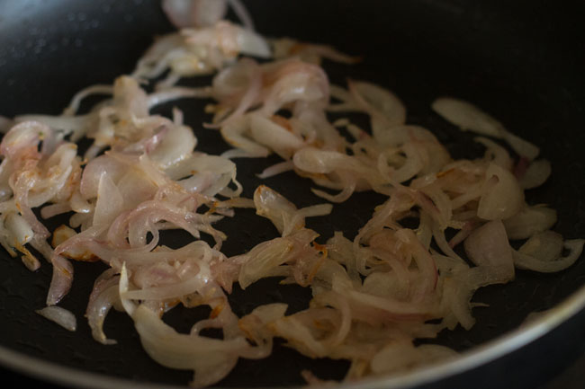 sautéing onions in hot oil till light golden