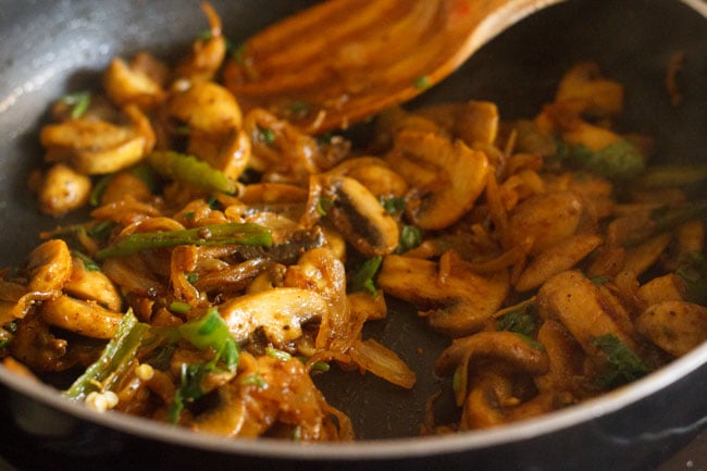 cooking mushroom fry in pan