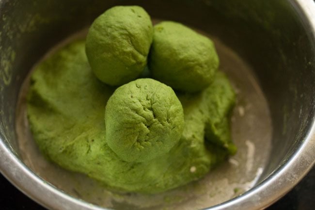 medium-sized palak paratha dough balls 