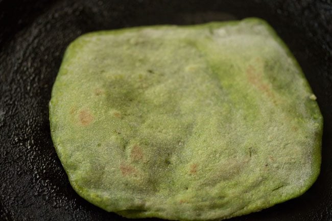 half cooked palak paratha