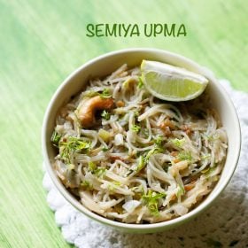 semiya upma served in a bowl with lemon wedges