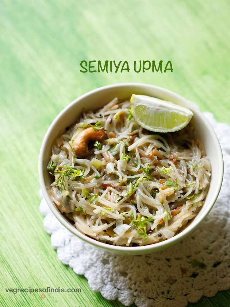 semiya upma served in a bowl with lemon wedges