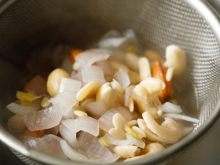 softened onions, nuts, seeds etc being strained