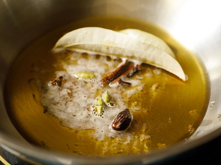 whole spices being fried