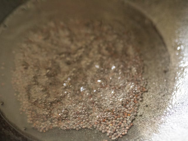 crackling mustard seeds in hot coconut oil. 